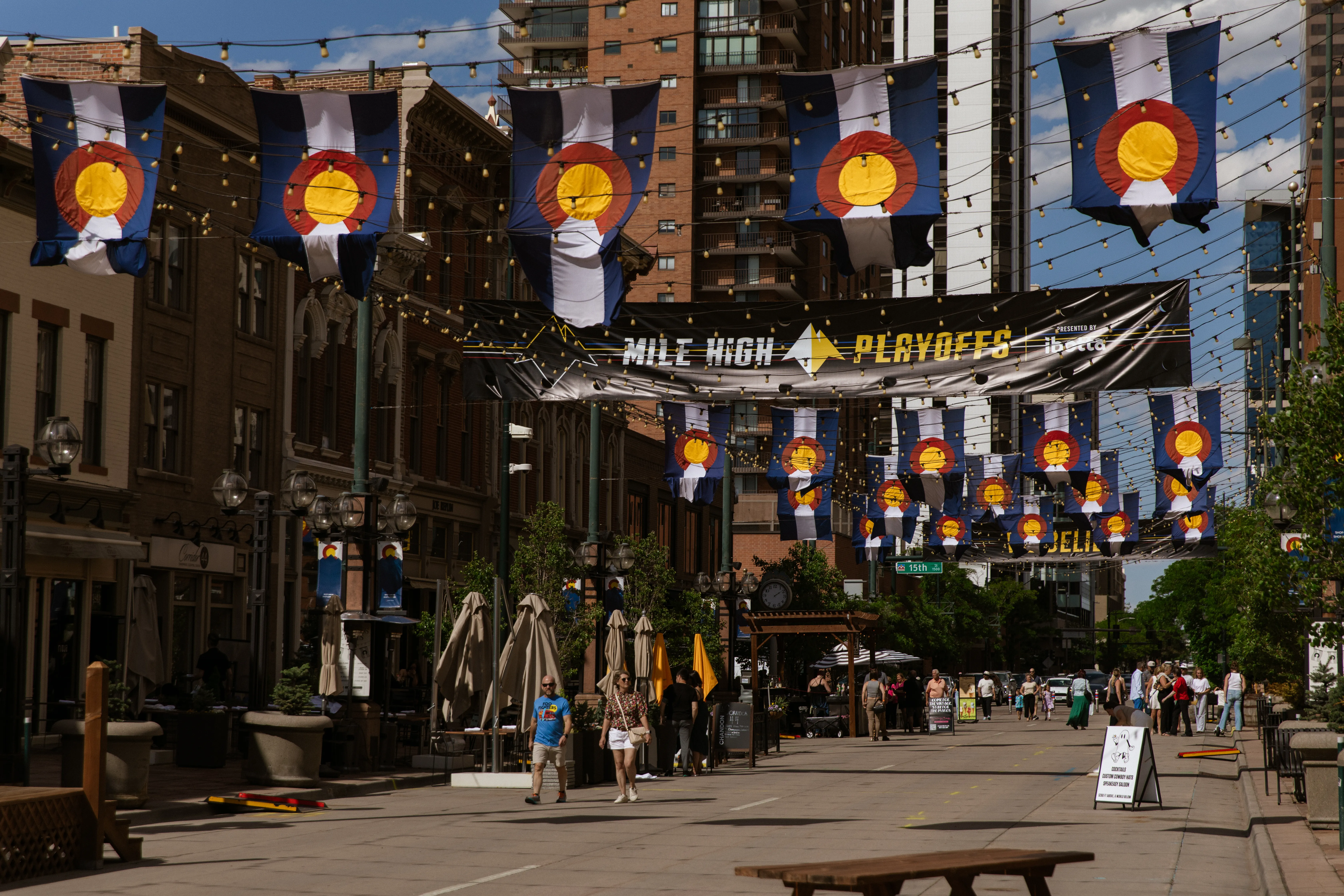 Larimer Square tables beneath the flags